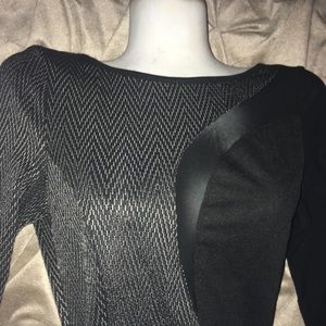 Black dress with slight sheer peek-a-boo on top